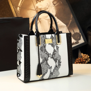 Snake skin design handbags